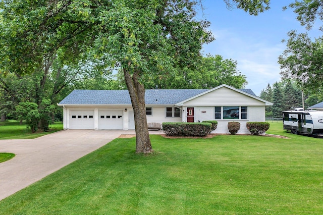 3945 8th Ave NW, Anoka, MN 55303 - ranch-style house featuring an attached garage, driveway, and a front lawn