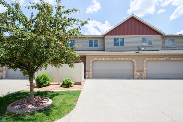 508 19th Ave W Unit C, West Fargo, ND 58078 - multi unit property featuring driveway, a garage, and stone siding