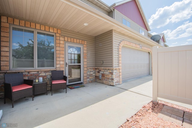 508 19th Ave W Unit C, West Fargo, ND 58078 - property entrance featuring stone siding and an attached garage