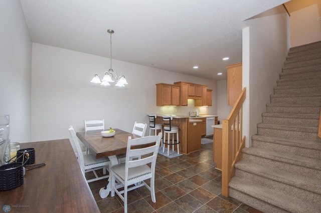 508 19th Ave W Unit C, West Fargo, ND 58078 - dining room featuring stairway, a chandelier, recessed lighting, and dark stone finish floors