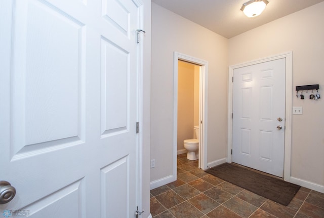 508 19th Ave W Unit C, West Fargo, ND 58078 - entryway featuring baseboards and stone finish flooring