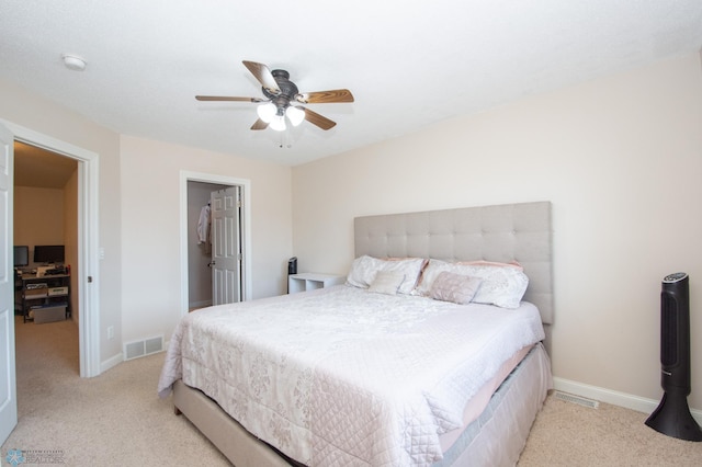 508 19th Ave W Unit C, West Fargo, ND 58078 - bedroom featuring light colored carpet and a ceiling fan