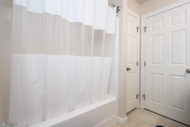 508 19th Ave W Unit C, West Fargo, ND 58078 - bathroom featuring tile patterned floors and shower / tub combo with curtain