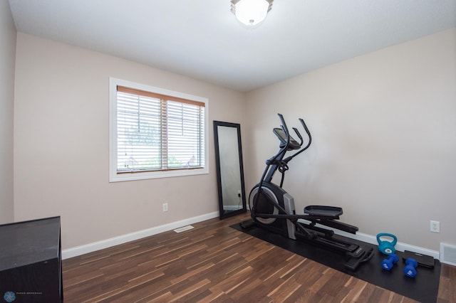 508 19th Ave W Unit C, West Fargo, ND 58078 - exercise room featuring dark wood-style flooring and baseboards