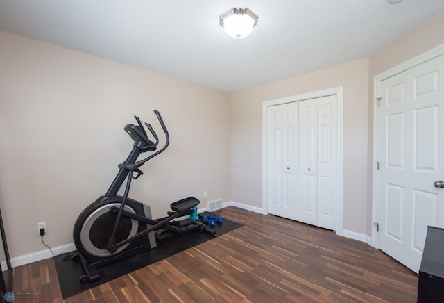 508 19th Ave W Unit C, West Fargo, ND 58078 - exercise room featuring dark wood finished floors and baseboards