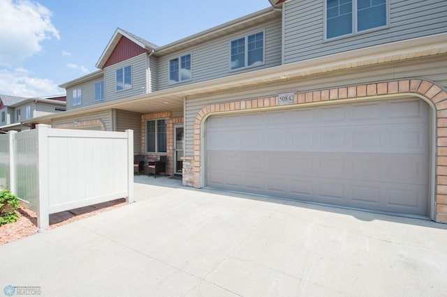 508 19th Ave W Unit C, West Fargo, ND 58078 - view of front of house with an attached garage and concrete driveway