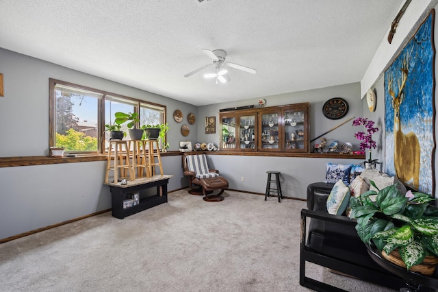 1613 Lyn Curve Ave N, Minneapolis, MN 55411 - sitting room with carpet flooring, a ceiling fan, and a textured ceiling