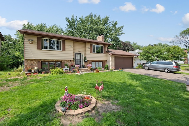 1613 Lyn Curve Ave N, Minneapolis, MN 55411 - bi-level home featuring a chimney, a front yard, driveway, brick siding, and french doors