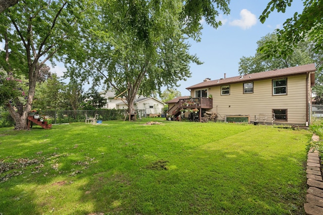 1613 Lyn Curve Ave N, Minneapolis, MN 55411 - view of yard with stairway and a wooden deck