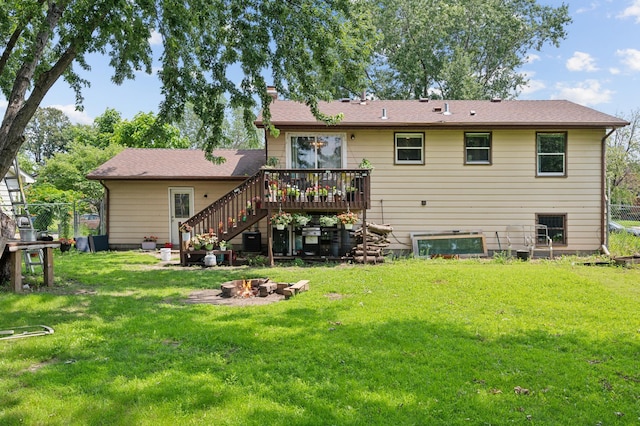 1613 Lyn Curve Ave N, Minneapolis, MN 55411 - rear view of house featuring stairs, a chimney, an outdoor fire pit, and a wooden deck