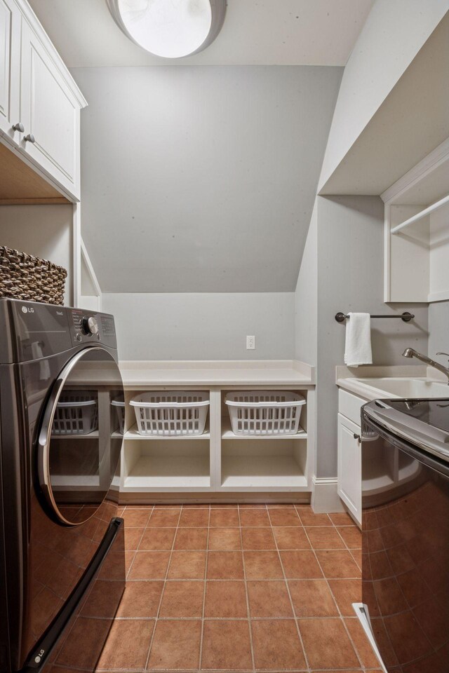 849 Brown Rd N, Orono, MN 55356 - laundry room with cabinet space, washer / dryer, and light tile patterned flooring