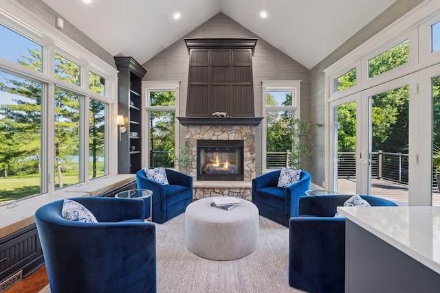 849 Brown Rd N, Orono, MN 55356 - living area with vaulted ceiling, a fireplace, plenty of natural light, recessed lighting, and wood finished floors