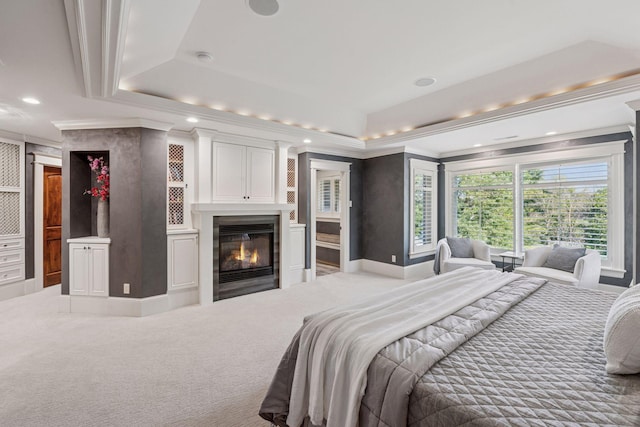 849 Brown Rd N, Orono, MN 55356 - carpeted bedroom featuring a raised ceiling, crown molding, a large fireplace, and recessed lighting