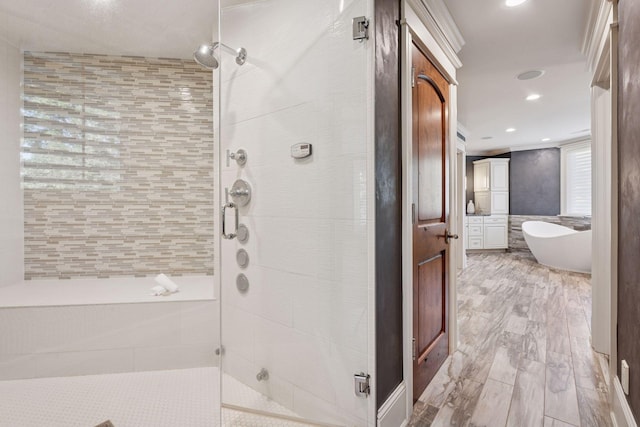849 Brown Rd N, Orono, MN 55356 - bathroom featuring a shower stall, a soaking tub, and recessed lighting