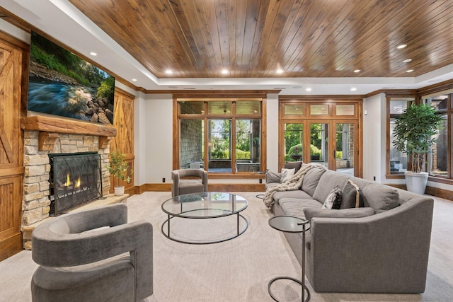849 Brown Rd N, Orono, MN 55356 - carpeted living room featuring a fireplace, wooden ceiling, a tray ceiling, recessed lighting, and ornamental molding