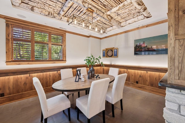 849 Brown Rd N, Orono, MN 55356 - dining space with a wainscoted wall, wood walls, and crown molding
