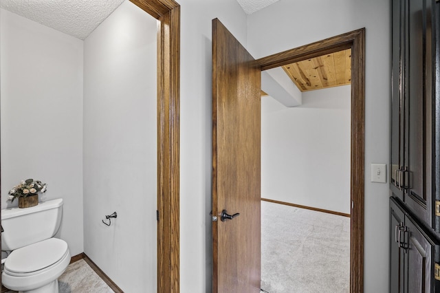2801 263rd Ave NE, Isanti, MN 55040 - bathroom featuring toilet and a textured ceiling