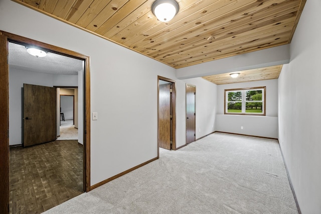 2801 263rd Ave NE, Isanti, MN 55040 - carpeted empty room with wooden ceiling