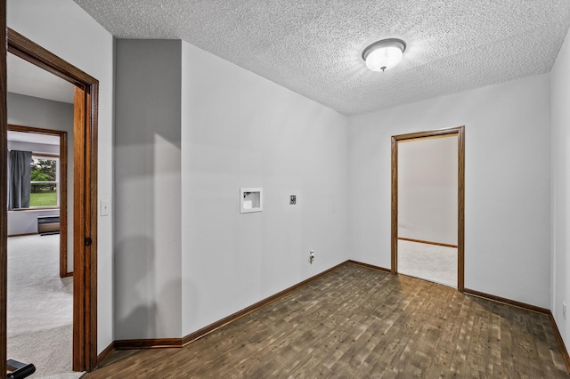 2801 263rd Ave NE, Isanti, MN 55040 - empty room with a textured ceiling and dark wood-style flooring