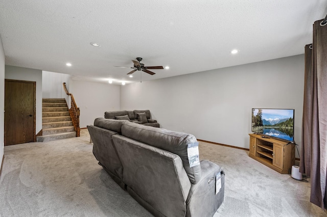 2801 263rd Ave NE, Isanti, MN 55040 - living area with light colored carpet, stairs, recessed lighting, and ceiling fan