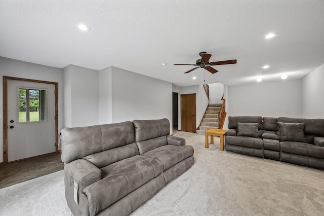 2801 263rd Ave NE, Isanti, MN 55040 - living area with stairs, recessed lighting, a ceiling fan, and light colored carpet