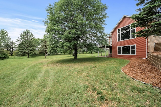 2801 263rd Ave NE, Isanti, MN 55040 - view of green lawn with a deck