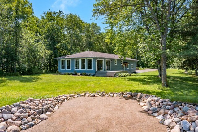 26877 Rainbow Ln, Merrifield, MN 56465 - rear view of house with a lawn