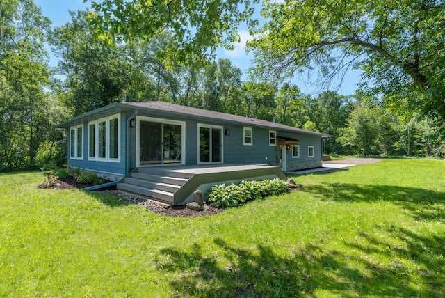 26877 Rainbow Ln, Merrifield, MN 56465 - rear view of property with a yard and a deck