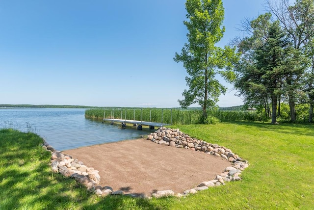 26877 Rainbow Ln, Merrifield, MN 56465 - dock with a water view and a lawn