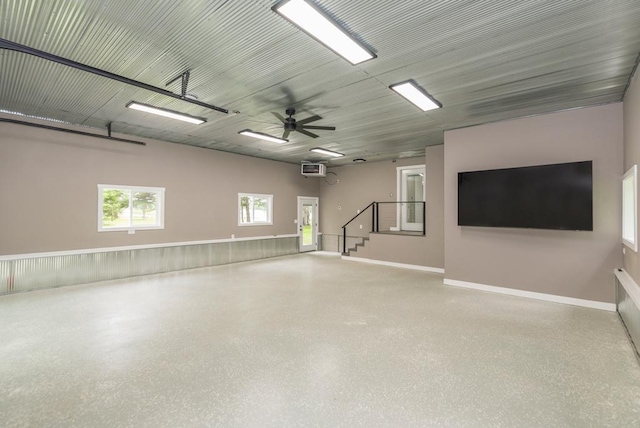 26877 Rainbow Ln, Merrifield, MN 56465 - garage with ceiling fan and baseboards