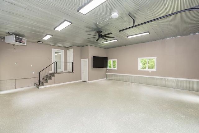 26877 Rainbow Ln, Merrifield, MN 56465 - garage featuring a ceiling fan and a heating unit