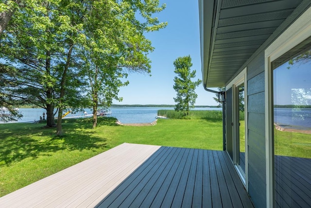 26877 Rainbow Ln, Merrifield, MN 56465 - wooden terrace featuring a water view and a lawn