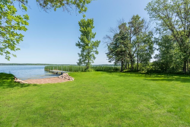 26877 Rainbow Ln, Merrifield, MN 56465 - view of green lawn with a water view