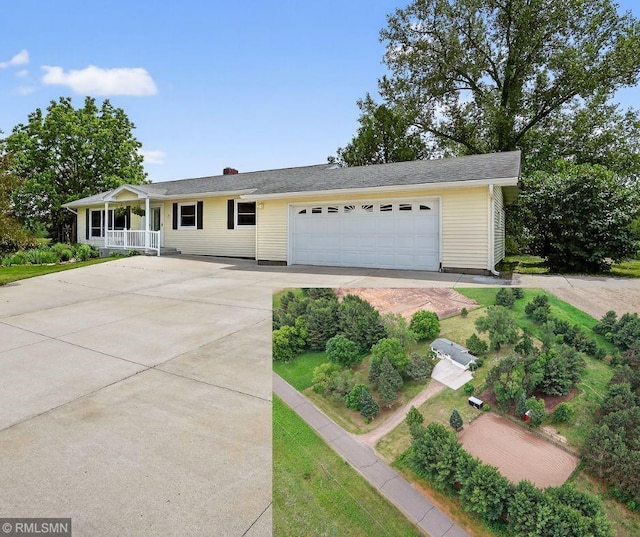2727 225th Ave, Auburn Twp, WI 54757 - ranch-style home with covered porch, concrete driveway, and a garage