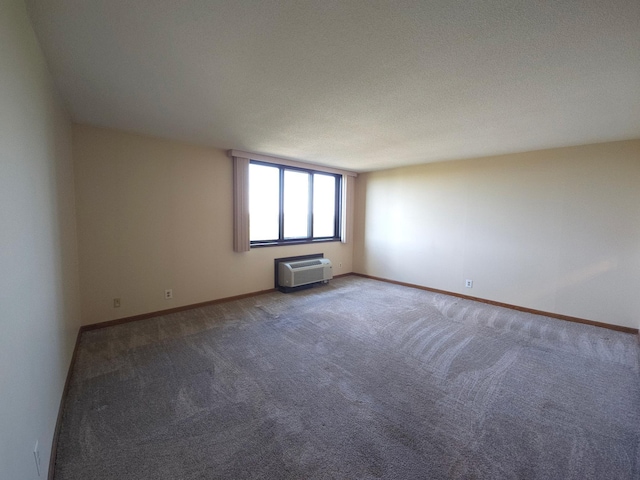 1181 Edgcumbe Rd Unit 709, Saint Paul, MN 55105 - empty room featuring a wall mounted air conditioner and carpet
