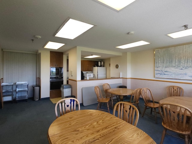 1181 Edgcumbe Rd Unit 709, Saint Paul, MN 55105 - dining area featuring dark colored carpet