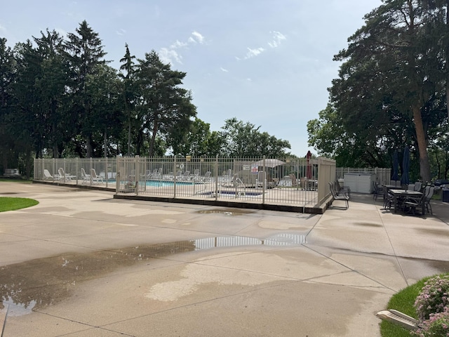 11030 Mississippi Blvd NW Unit 327, Coon Rapids, MN 55433 - view of home's community featuring a patio and a swimming pool