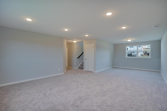 19916 English Ln N, Forest Lake, MN 55025 - unfurnished room featuring light carpet, recessed lighting, and stairway