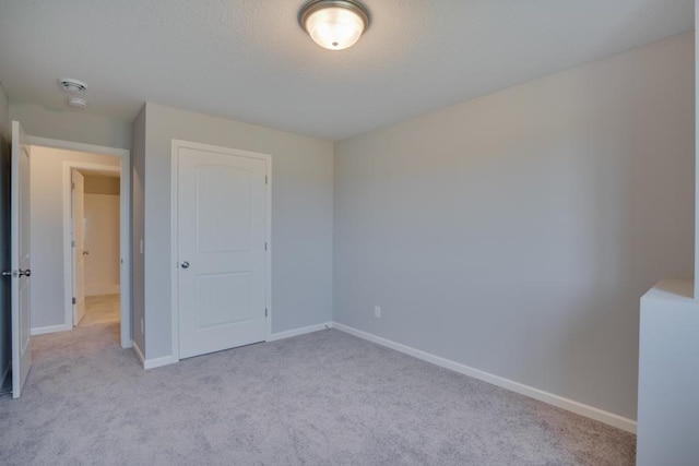 19916 English Ln N, Forest Lake, MN 55025 - unfurnished bedroom featuring light carpet and a closet