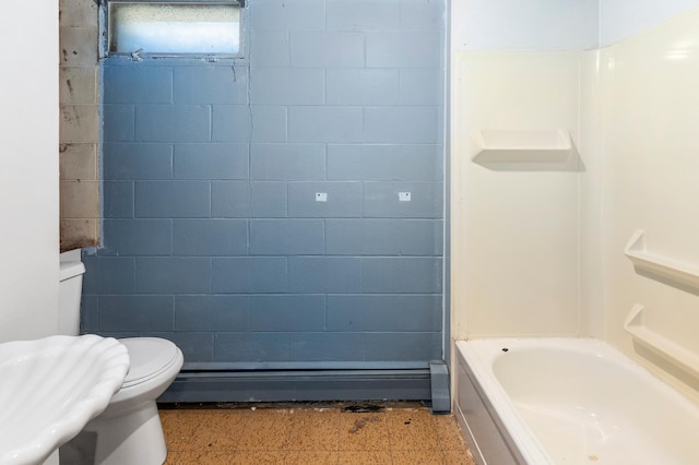 7 Pleasant Ave SE, Remer, MN 56672 - bathroom featuring baseboard heating and concrete block wall