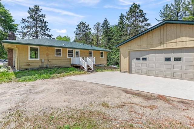 7 Pleasant Ave SE, Remer, MN 56672 - single story home featuring a garage and a chimney