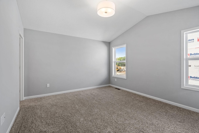 19926 English Ln N, Forest Lake, MN 55025 - carpeted spare room featuring vaulted ceiling and baseboards