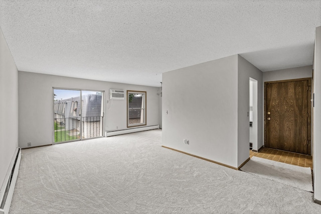 814 9th Ave S Unit 5, Hopkins, MN 55343 - carpeted empty room featuring baseboard heating, a baseboard radiator, a textured ceiling, and a wall unit AC