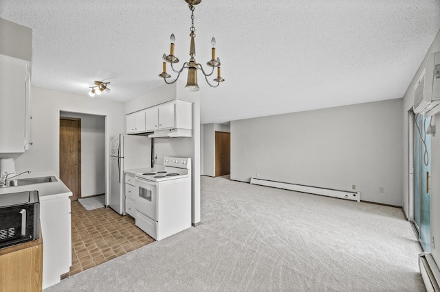 814 9th Ave S Unit 5, Hopkins, MN 55343 - kitchen with a baseboard radiator, white appliances, white cabinets, a chandelier, and a textured ceiling