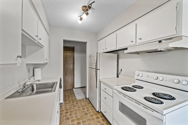 814 9th Ave S Unit 5, Hopkins, MN 55343 - kitchen featuring white appliances, under cabinet range hood, white cabinetry, light countertops, and a textured ceiling