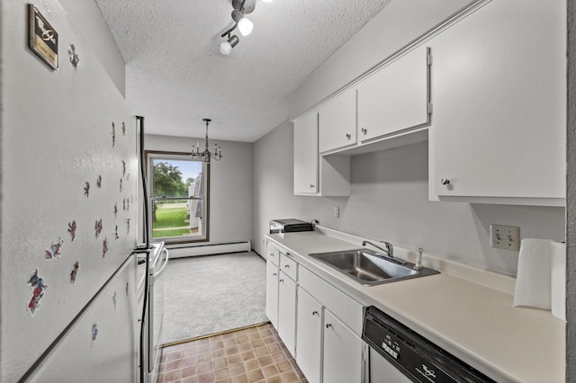 814 9th Ave S Unit 5, Hopkins, MN 55343 - kitchen featuring a baseboard radiator, white cabinetry, light carpet, light countertops, and a textured ceiling