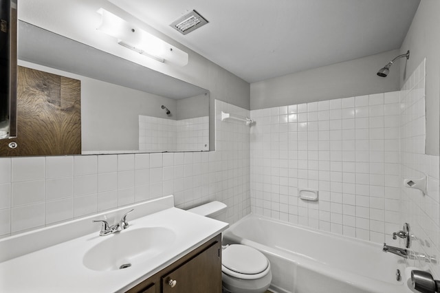 814 9th Ave S Unit 5, Hopkins, MN 55343 - bathroom with bathtub / shower combination, vanity, and tile walls