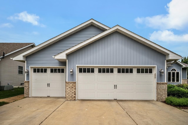 121 Arbor St, Northfield, MN 55057 - view of front of property featuring a garage, concrete driveway, and brick siding