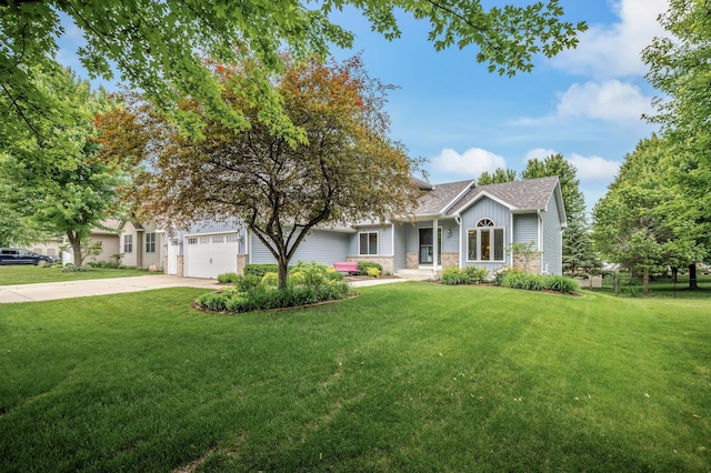 121 Arbor St, Northfield, MN 55057 - view of front of property with concrete driveway, an attached garage, a front lawn, and board and batten siding