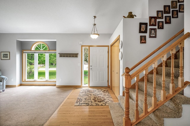 121 Arbor St, Northfield, MN 55057 - foyer entrance with light wood-style flooring and stairs